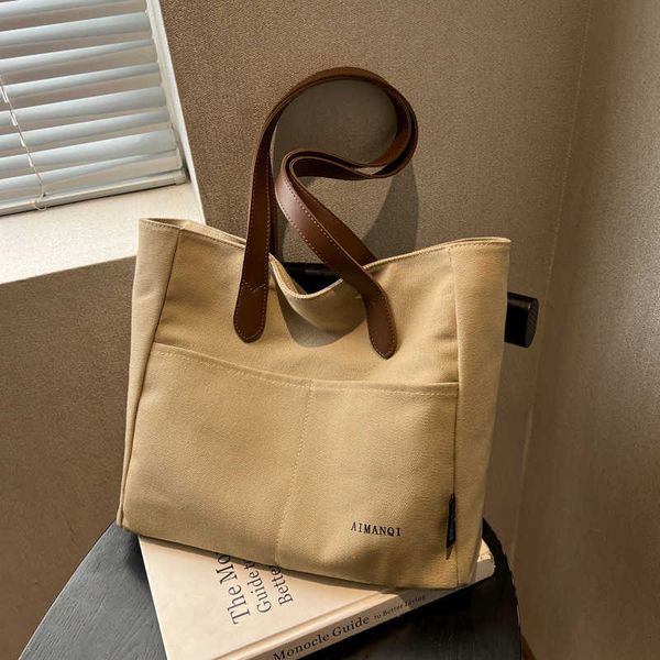 casual bag for women's spring new large capacity handbag canvas texture niche one shoulder tote bag
casual bag for women's spring new large capacity handbag canvas texture niche one shoulder tote bag