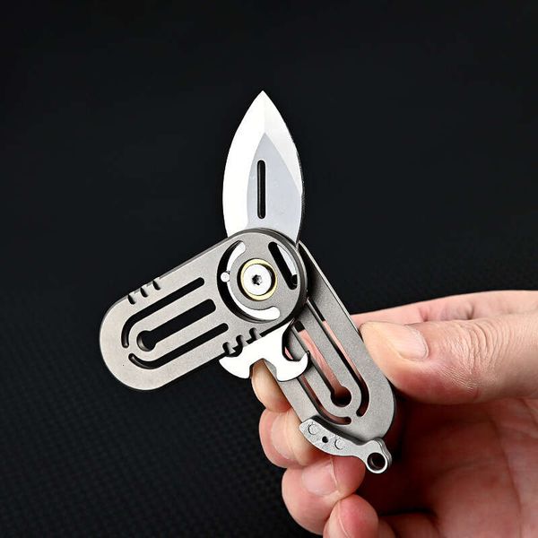 360° rotating mini knife titanium alloy handle d2 blade multifunctional bottle opener screwdriver outdoor edc self-defens tool, Silver
360° rotating mini knife titanium alloy handle d2 blade multifunctional bottle opener screwdriver outdoor edc self-defens tool, Silver