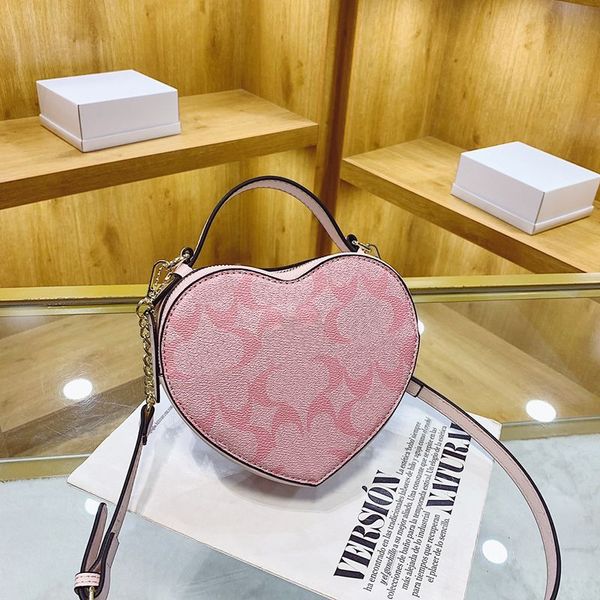 new quality desinger heart shaped bag mini cute shoulder bag women co handbag vintage cloudy tote leather fashion pink crossbody bag
new quality desinger heart shaped bag mini cute shoulder bag women co handbag vintage cloudy tote leather fashion pink crossbody bag