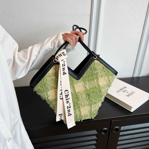 this year's popular bag new niche handheld women's bag fashion checked shoulder bag women's large capacity tote bag
this year's popular bag new niche handheld women's bag fashion checked shoulder bag women's large capacity tote bag