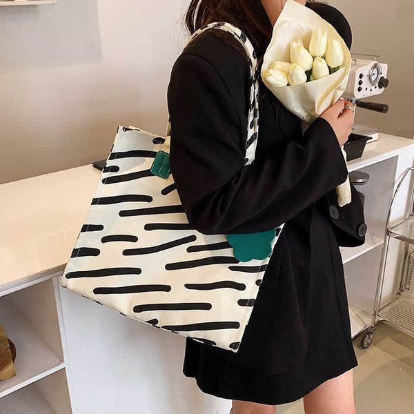 canvas bag large capacity female student versatile class bag single shoulder bag female ins super popular design sense tote bag
canvas bag large capacity female student versatile class bag single shoulder bag female ins super popular design sense tote bag
