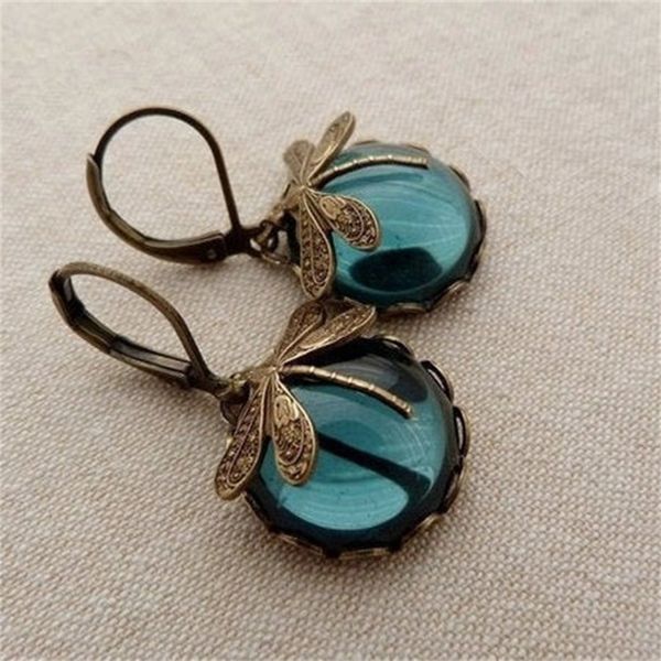 stud vintage bronze dragonfly earrings fashion gold color metal carving pattern inlaid moonstone drop for women jewelry 230710, Golden;silver
stud vintage bronze dragonfly earrings fashion gold color metal carving pattern inlaid moonstone drop for women jewelry 230710, Golden;silver