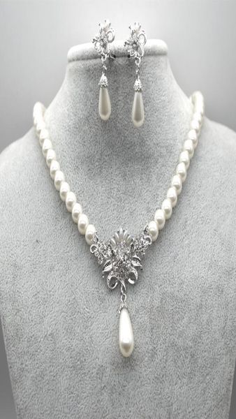 rhodium silver plated cream glass pearl and rhinestone crystal floral bridal necklace and stud earrings jewelry sets2818969
rhodium silver plated cream glass pearl and rhinestone crystal floral bridal necklace and stud earrings jewelry sets2818969
