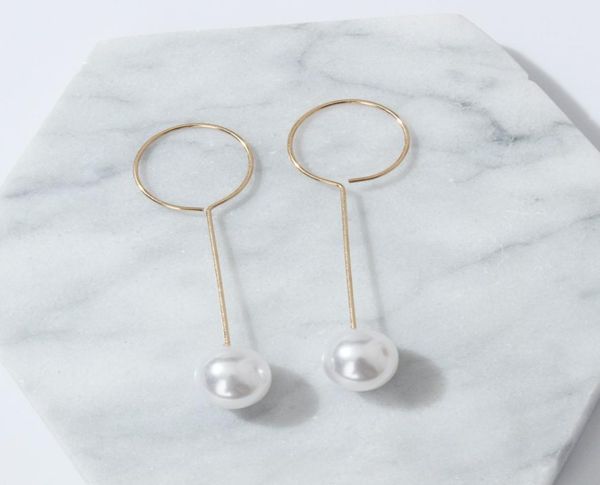 e197 korean style pearl earrings celebrity wind long pearl circle tassel earrings simple lady6198399, Golden;silver
e197 korean style pearl earrings celebrity wind long pearl circle tassel earrings simple lady6198399, Golden;silver