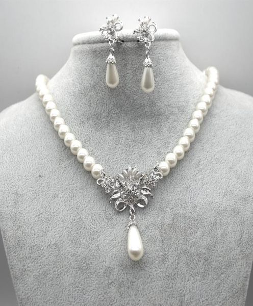 rhodium silver plated cream glass pearl and rhinestone crystal floral bridal necklace and stud earrings jewelry sets1846690
rhodium silver plated cream glass pearl and rhinestone crystal floral bridal necklace and stud earrings jewelry sets1846690