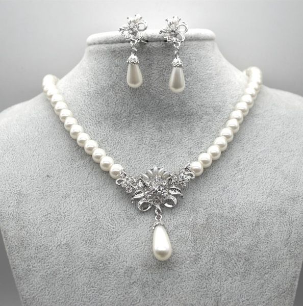 rhodium silver plated cream glass pearl and rhinestone crystal floral bridal necklace and stud earrings jewelry sets8922193
rhodium silver plated cream glass pearl and rhinestone crystal floral bridal necklace and stud earrings jewelry sets8922193