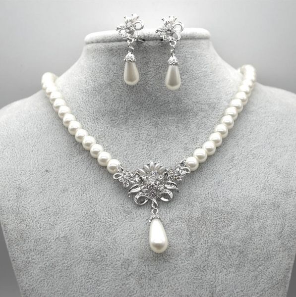 rhodium silver plated cream glass pearl and rhinestone crystal floral bridal necklace and stud earrings jewelry sets2635080
rhodium silver plated cream glass pearl and rhinestone crystal floral bridal necklace and stud earrings jewelry sets2635080