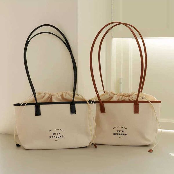 south korea's new splicing color contrast minority letter drawstring leisure printed canvas bag women's band mouth one shoulder to
south korea's new splicing color contrast minority letter drawstring leisure printed canvas bag women's band mouth one shoulder to