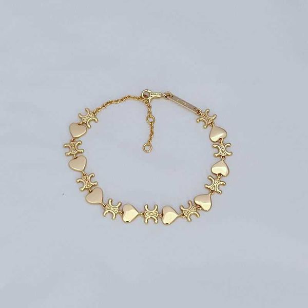new sweet and gentle temperament style heart shaped arc de triomphe design smooth face bracelet handpiece, Golden;silver
new sweet and gentle temperament style heart shaped arc de triomphe design smooth face bracelet handpiece, Golden;silver