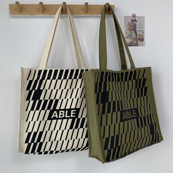 new canvas bag large capacity men's and women's portable one shoulder student book canvas bag small public tote bag
new canvas bag large capacity men's and women's portable one shoulder student book canvas bag small public tote bag