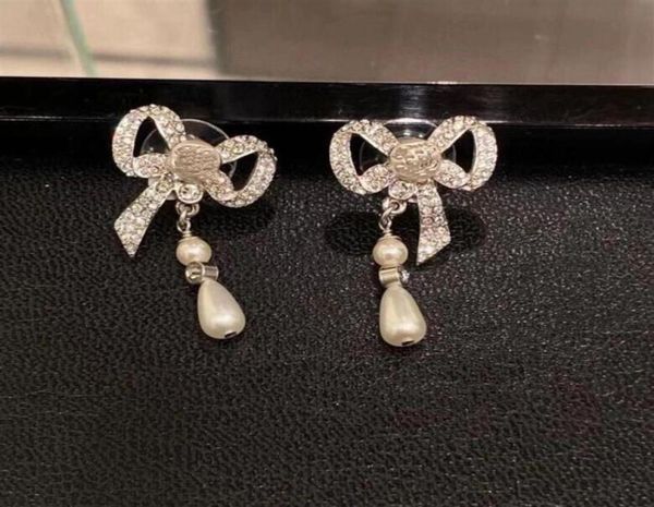 fashion bow earrings dangle drop crystal earring women weeding jewelry with bag for gift285a5139063, Silver
fashion bow earrings dangle drop crystal earring women weeding jewelry with bag for gift285a5139063, Silver