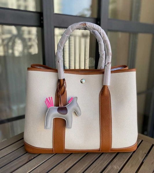 garden party bags designer spring new 2023 canvas with layer cowhide garden bag color contrast fashion handbag versatile messenger8c26
garden party bags designer spring new 2023 canvas with layer cowhide garden bag color contrast fashion handbag versatile messenger8c26