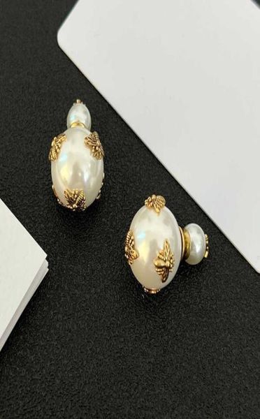 the new letter size pearl hoop are suitable for women bee earrings gifts white pearl love earrings fashion brand luxury jewelry8036976, Golden;silver
the new letter size pearl hoop are suitable for women bee earrings gifts white pearl love earrings fashion brand luxury jewelry8036976, Golden;silver