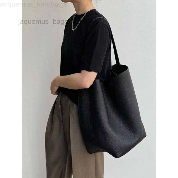 the designer rows high-capacity bag leather bag cowhide winter small capacity commuter tote women's one shoulder handheld bucket the ro
the designer rows high-capacity bag leather bag cowhide winter small capacity commuter tote women's one shoulder handheld bucket the ro