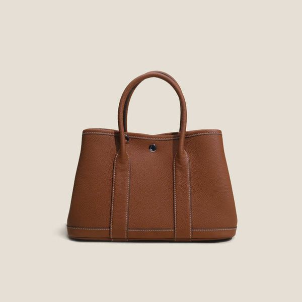 garden party bags designer layer new cowhide lychee patterned togo garden bag with large capacity genuine leather carrying for women single
garden party bags designer layer new cowhide lychee patterned togo garden bag with large capacity genuine leather carrying for women single