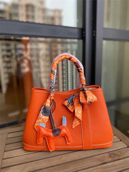 garden party bags designer togo layer cowhide bag 2023 new genuine leather bucket fashion portable garden women's 26vcl
garden party bags designer togo layer cowhide bag 2023 new genuine leather bucket fashion portable garden women's 26vcl