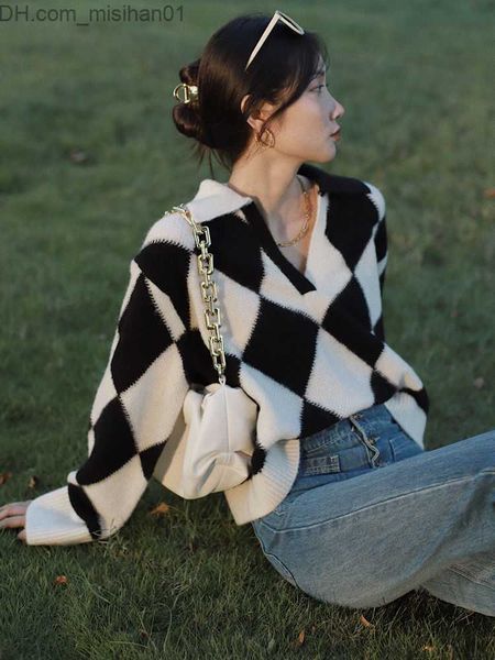 women's sweaters new black and white plaid v-neck patterned polo shirt diamond loose knit sweater warm patterned sweater women's z, White;black
women's sweaters new black and white plaid v-neck patterned polo shirt diamond loose knit sweater warm patterned sweater women's z, White;black