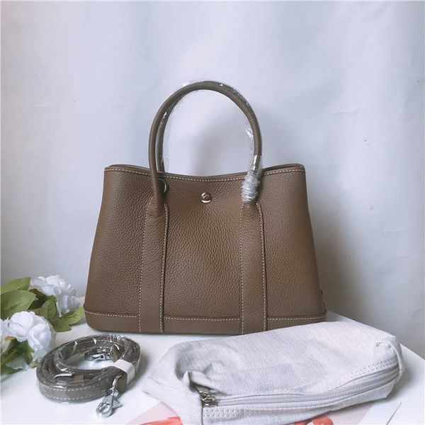 garden party bags designer women's bag new baotou layer cowhide litchi pattern fashion handheld one shoulder crossbody big517i
garden party bags designer women's bag new baotou layer cowhide litchi pattern fashion handheld one shoulder crossbody big517i