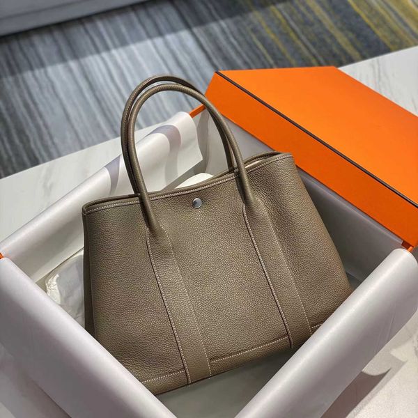garden party bags highest original cowhide 2023 new garden bag on the first floor hand sewn leisure commuting tote fashion versatile handbag
garden party bags highest original cowhide 2023 new garden bag on the first floor hand sewn leisure commuting tote fashion versatile handbag