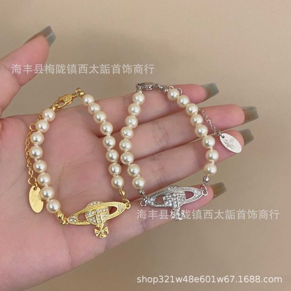 the empress dowager west is slightly safe. ouyang nana has the same high version of diamond saturn pearl bracelet. women's fashion, Golden;silver
the empress dowager west is slightly safe. ouyang nana has the same high version of diamond saturn pearl bracelet. women's fashion, Golden;silver