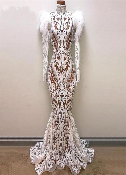 see through mermaid evening dresses with long sleeves lace appliques feathers dubai african prom dress long sleeves high neck part1818707, Black;red
see through mermaid evening dresses with long sleeves lace appliques feathers dubai african prom dress long sleeves high neck part1818707, Black;red