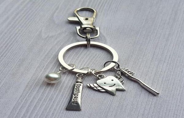 tibetan silver care for the teeth dentist dental hygienist fairy toothpaste toothbrush charm pendant key chain ring car diy keycha3681014, Slivery;golden
tibetan silver care for the teeth dentist dental hygienist fairy toothpaste toothbrush charm pendant key chain ring car diy keycha3681014, Slivery;golden