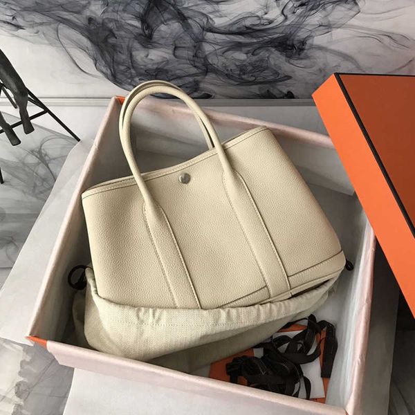 garden party bags highest original line handmade wax bag togo cowhide business handbag leisure commuter tote women's 1ek1f
garden party bags highest original line handmade wax bag togo cowhide business handbag leisure commuter tote women's 1ek1f