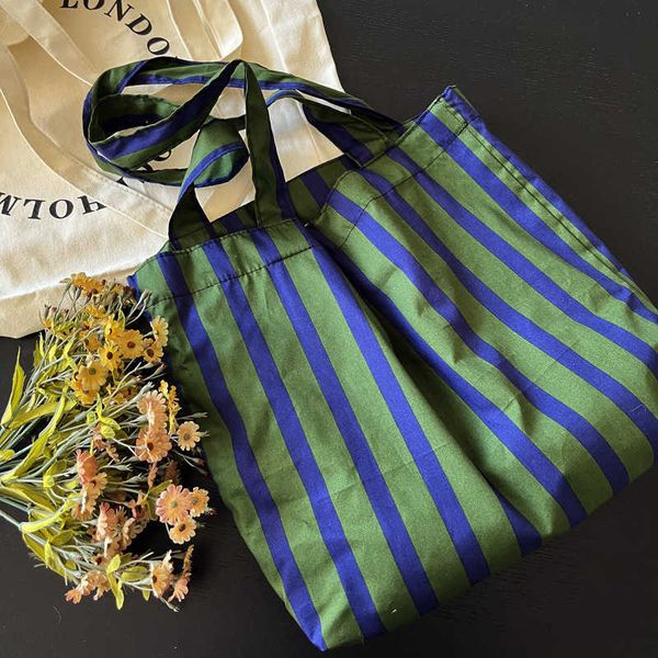 ins french small blue green wide stripe shoulder bag versatile lazy cotton large capacity tote bag women's bag
ins french small blue green wide stripe shoulder bag versatile lazy cotton large capacity tote bag women's bag
