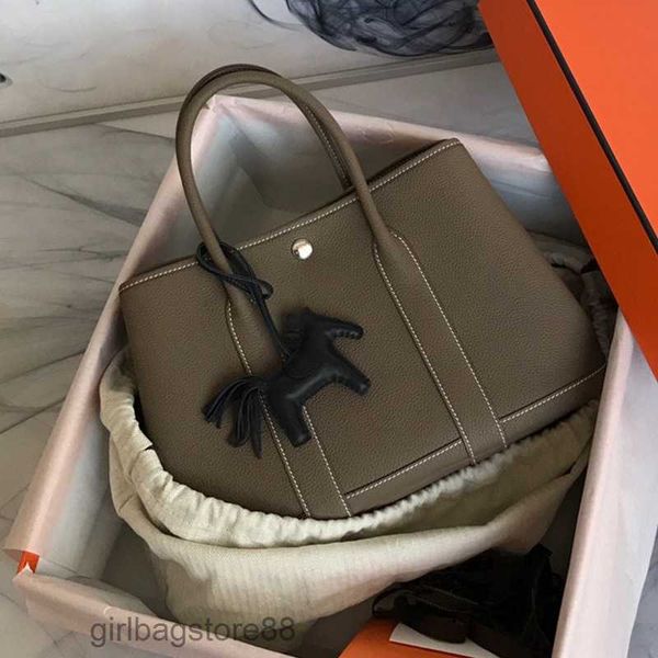 2023 classic designer garden totes bag real leather lady bags genuine h handbags wax line tote garden party togo cowhide handbag leisure tot
2023 classic designer garden totes bag real leather lady bags genuine h handbags wax line tote garden party togo cowhide handbag leisure tot