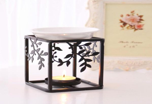 art iron stand ceramic oil burner aromatherapy furnace essential oil lamp gifts crafts home decorations9659603
art iron stand ceramic oil burner aromatherapy furnace essential oil lamp gifts crafts home decorations9659603