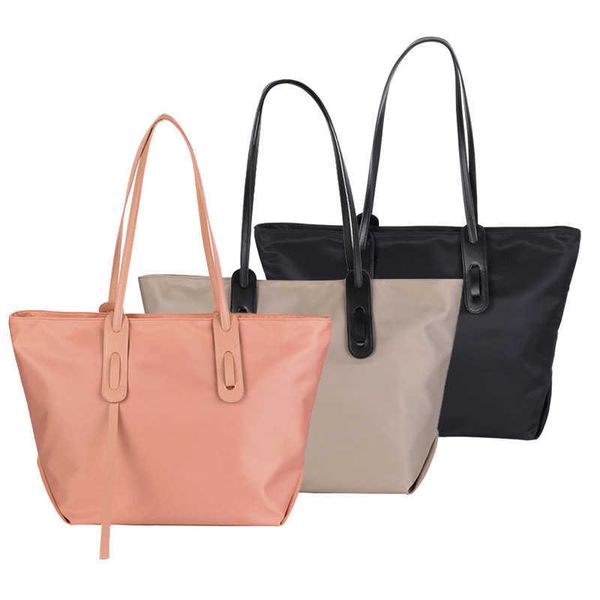large capacity versatile one shoulder niche women's bag tote bag trend handbag nylon dumplings version
large capacity versatile one shoulder niche women's bag tote bag trend handbag nylon dumplings version