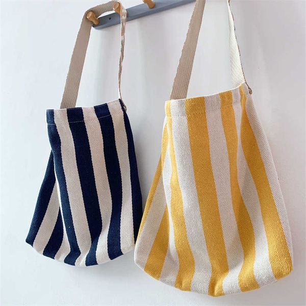 small group fabric shoulder bag simple and fashionable versatile striped women's bag large capacity high appearance cotton tote bag 
small group fabric shoulder bag simple and fashionable versatile striped women's bag large capacity high appearance cotton tote bag