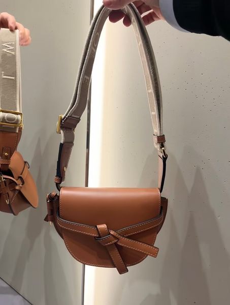 shoulder bags shoulder bags cross body luxury designer bag saddle bag embossed pebble calf leather bow bag detachable shoulder strap shoulde
shoulder bags shoulder bags cross body luxury designer bag saddle bag embossed pebble calf leather bow bag detachable shoulder strap shoulde