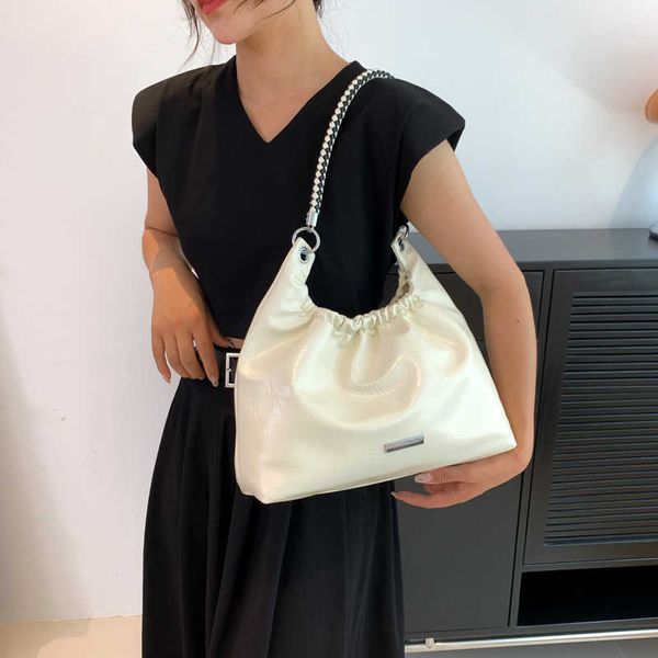 version fashion casual niche texture chain tote bag for women's new summer high capacity trendy crossbody bag
version fashion casual niche texture chain tote bag for women's new summer high capacity trendy crossbody bag