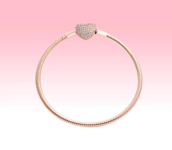 18k rose gold plated charms bracelets with original box for 925 silver love hearts chain bracelet women wedding jewelry1988252, Golden;silver
18k rose gold plated charms bracelets with original box for 925 silver love hearts chain bracelet women wedding jewelry1988252, Golden;silver