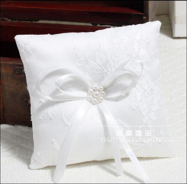 white lace rings pillows with ribbon bow sash pearls crystal pillows form rings bridal and groom6481471
white lace rings pillows with ribbon bow sash pearls crystal pillows form rings bridal and groom6481471
