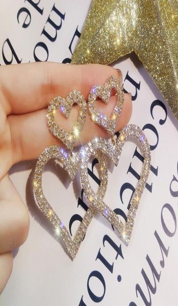 double love earrings with rhinestones heart dangle s925 silver needle ear dropfor women and girls fashion jewelry8855950
double love earrings with rhinestones heart dangle s925 silver needle ear dropfor women and girls fashion jewelry8855950