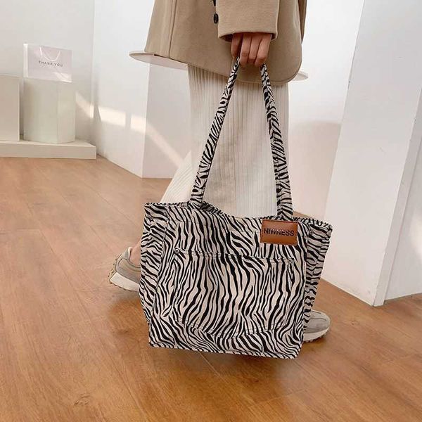 canvas tote bag zebra pattern bag women's new fashion versatile version small and large capacity shoulder bag
canvas tote bag zebra pattern bag women's new fashion versatile version small and large capacity shoulder bag