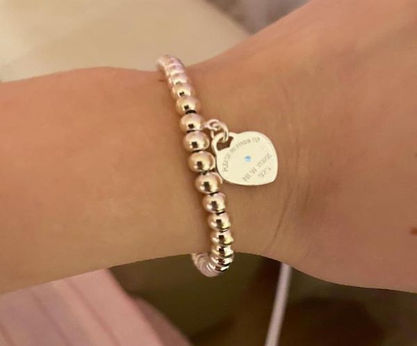 100 silver designer heart beaded bracelet women strands love mini t tag with diamond couple round ball chain bracelets fashion je1086791, Black
100 silver designer heart beaded bracelet women strands love mini t tag with diamond couple round ball chain bracelets fashion je1086791, Black