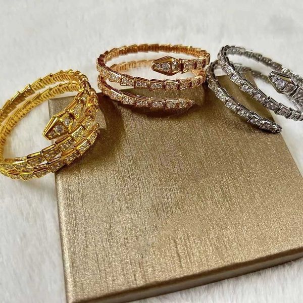 18k rose gold snake shaped women's full diamond mesh red colorless fashion personality trend bracelet, Golden;silver 
18k rose gold snake shaped women's full diamond mesh red colorless fashion personality trend bracelet, Golden;silver