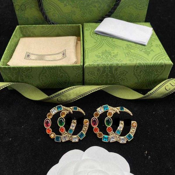 no box luxury style women designer studs colorful diamonds brass fashion couple earrings, Golden;silver
no box luxury style women designer studs colorful diamonds brass fashion couple earrings, Golden;silver