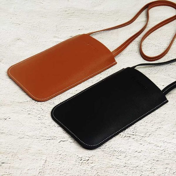 sander japanese jil jil mobile phone bag with tactile leather for men and women can be used as a small hanging bag with a simple shoulder an
sander japanese jil jil mobile phone bag with tactile leather for men and women can be used as a small hanging bag with a simple shoulder an