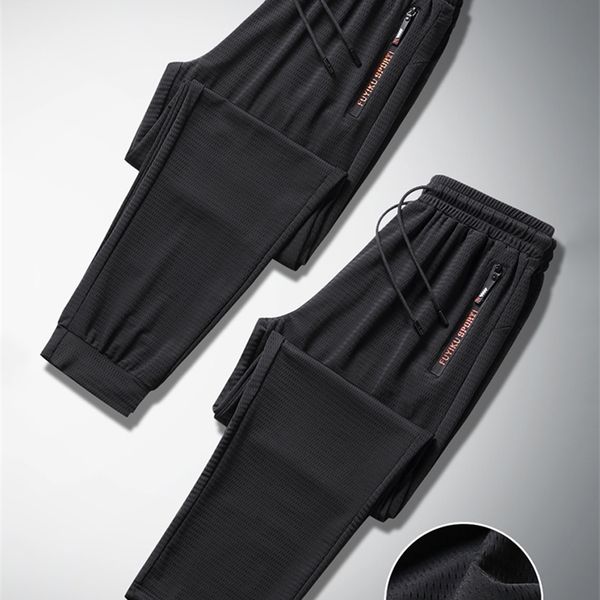 men s pants summer breathable mesh black sweatpants men joggers sportswear baggy trousers male casual track plus size 7xl 8xl 9xl 230711
men s pants summer breathable mesh black sweatpants men joggers sportswear baggy trousers male casual track plus size 7xl 8xl 9xl 230711