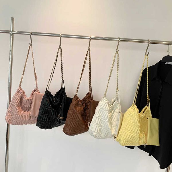 style minimalist large capacity underarm bag for women in spring/summer niche texture tote bag fashionable pleated shoulder bag
style minimalist large capacity underarm bag for women in spring/summer niche texture tote bag fashionable pleated shoulder bag