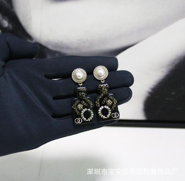 dangle & chandelier european and american luxury brand jewelry black perfume bottle resin earrings high-end luxury fashion versatile, Silver
dangle & chandelier european and american luxury brand jewelry black perfume bottle resin earrings high-end luxury fashion versatile, Silver