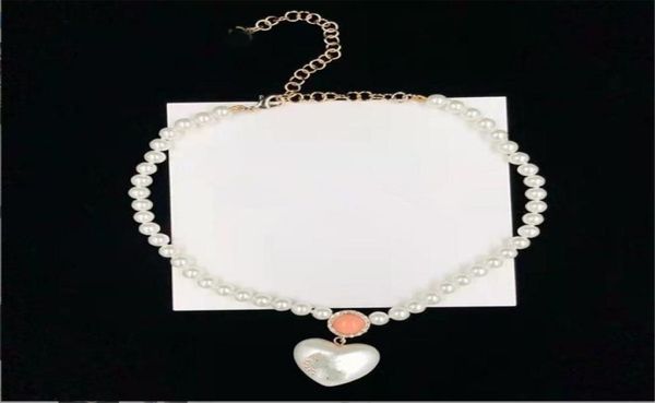 luxury jewelry heart shaped middle rhinestone pearl brass necklace european and american fashion simple sweater chain1479182, Golden;silver
luxury jewelry heart shaped middle rhinestone pearl brass necklace european and american fashion simple sweater chain1479182, Golden;silver