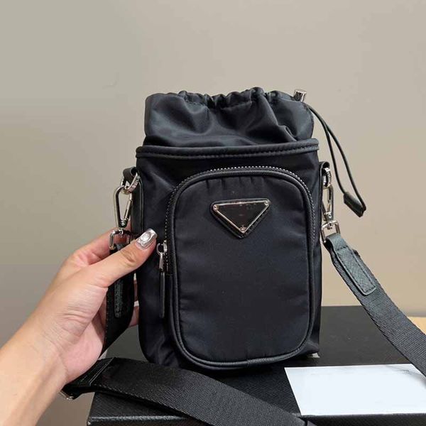 nylon drawstring crossbody bag black phone bag handbag purse adjustable embroidered shoulder strap triangle decoration designer shoulder bag
nylon drawstring crossbody bag black phone bag handbag purse adjustable embroidered shoulder strap triangle decoration designer shoulder bag