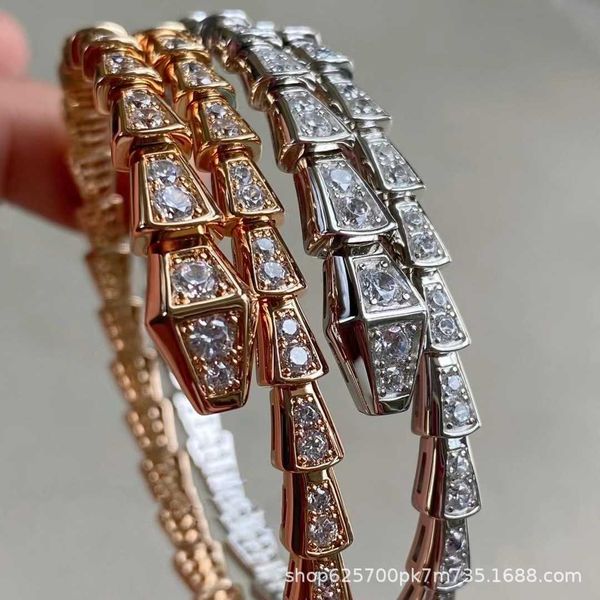 baojia spring women's 18k rose plating white gold open snake bone double layer three ring bracelet, Golden;silver
baojia spring women's 18k rose plating white gold open snake bone double layer three ring bracelet, Golden;silver