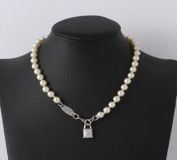 trendy jewelry saturn pearl with enamel tridimensional lock necklace for women8583815, Silver
trendy jewelry saturn pearl with enamel tridimensional lock necklace for women8583815, Silver