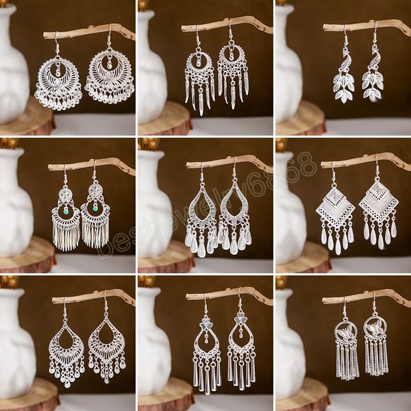 vintage long tassel silver color earrings retro hollow out geometry peacock dangle hanging earrings for women indian jewelry
vintage long tassel silver color earrings retro hollow out geometry peacock dangle hanging earrings for women indian jewelry